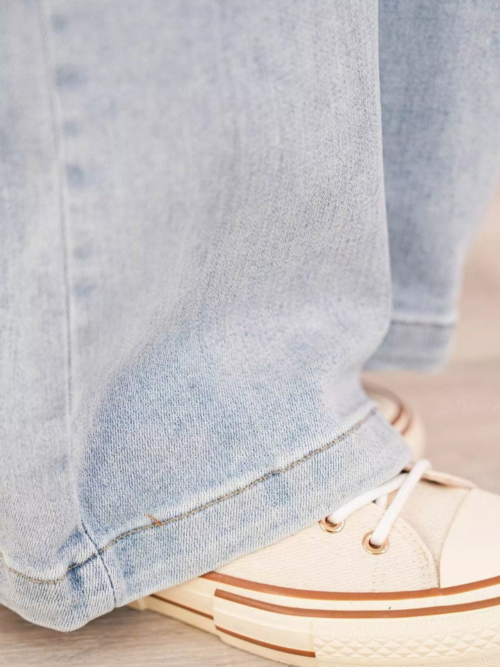 High-rise wide-leg cargo jeans with flap pockets
