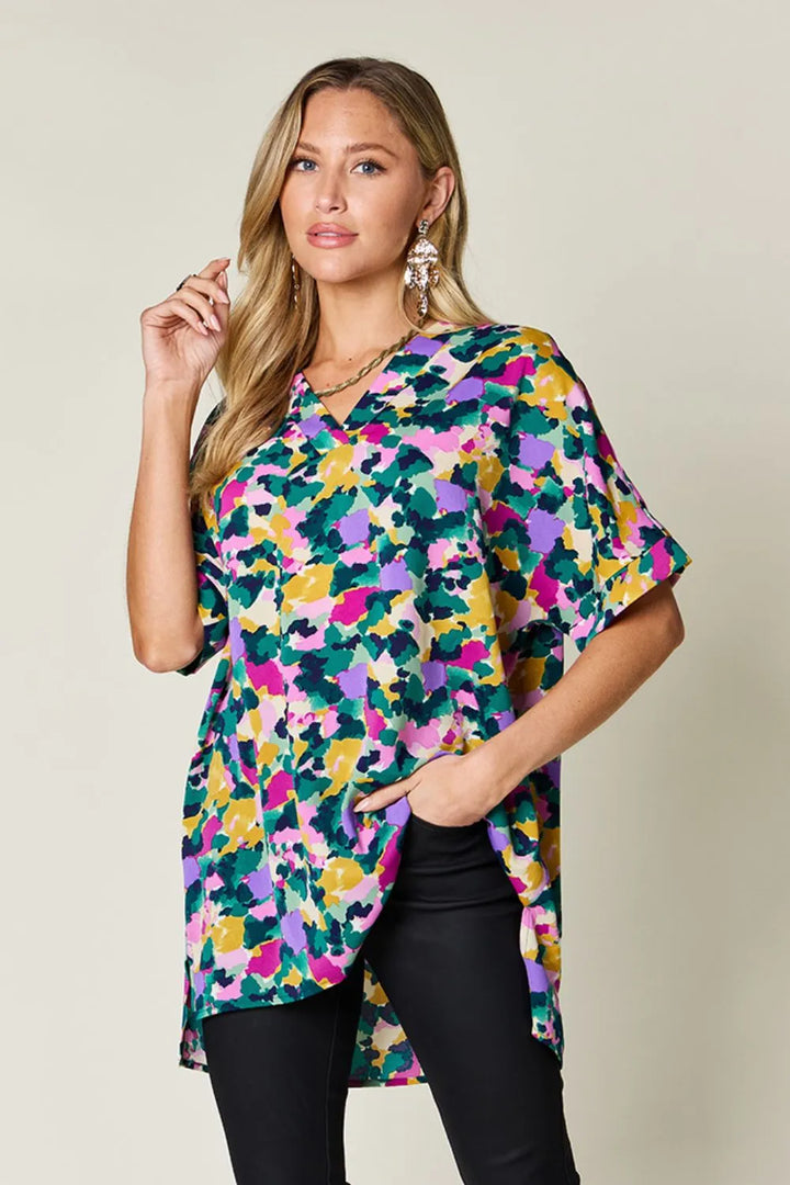 Green Abstract print v-neck tunic top with flutter sleeves and side slits