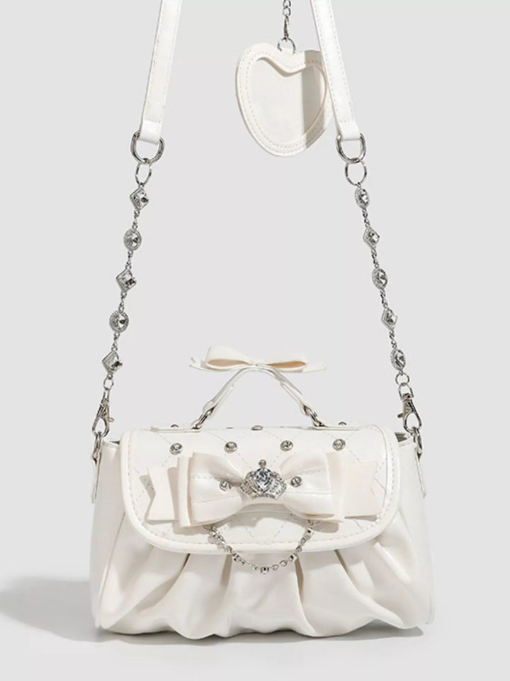 White Ruched bow crossbody bag with rhinestone chain strap