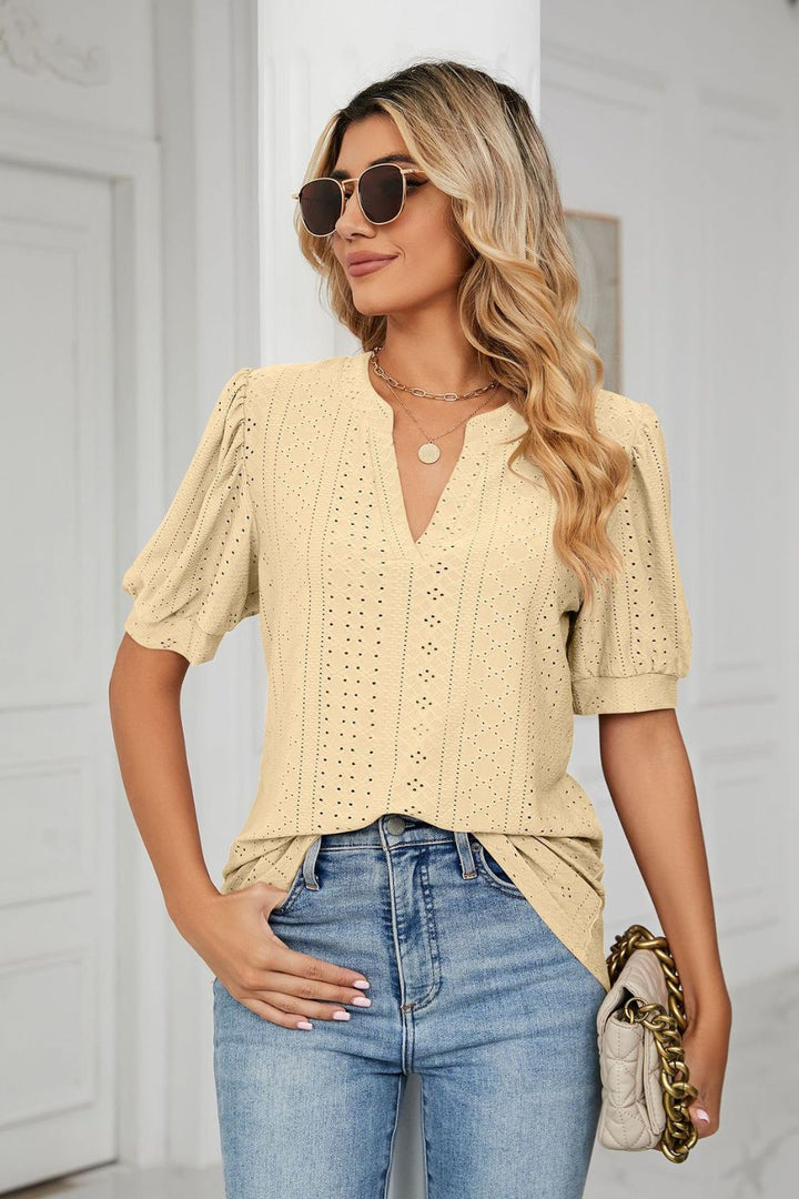 Yellow Eyelet puff sleeve top with notched V-neck