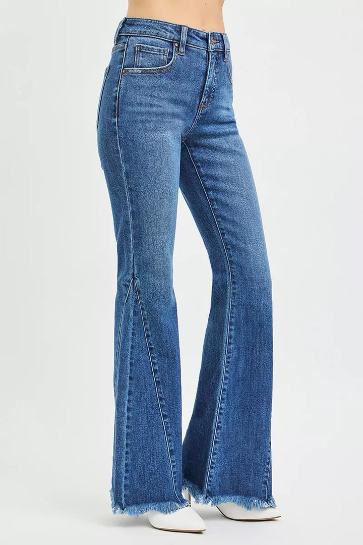 Mid-rise flare jeans with paneled side seams and raw hem