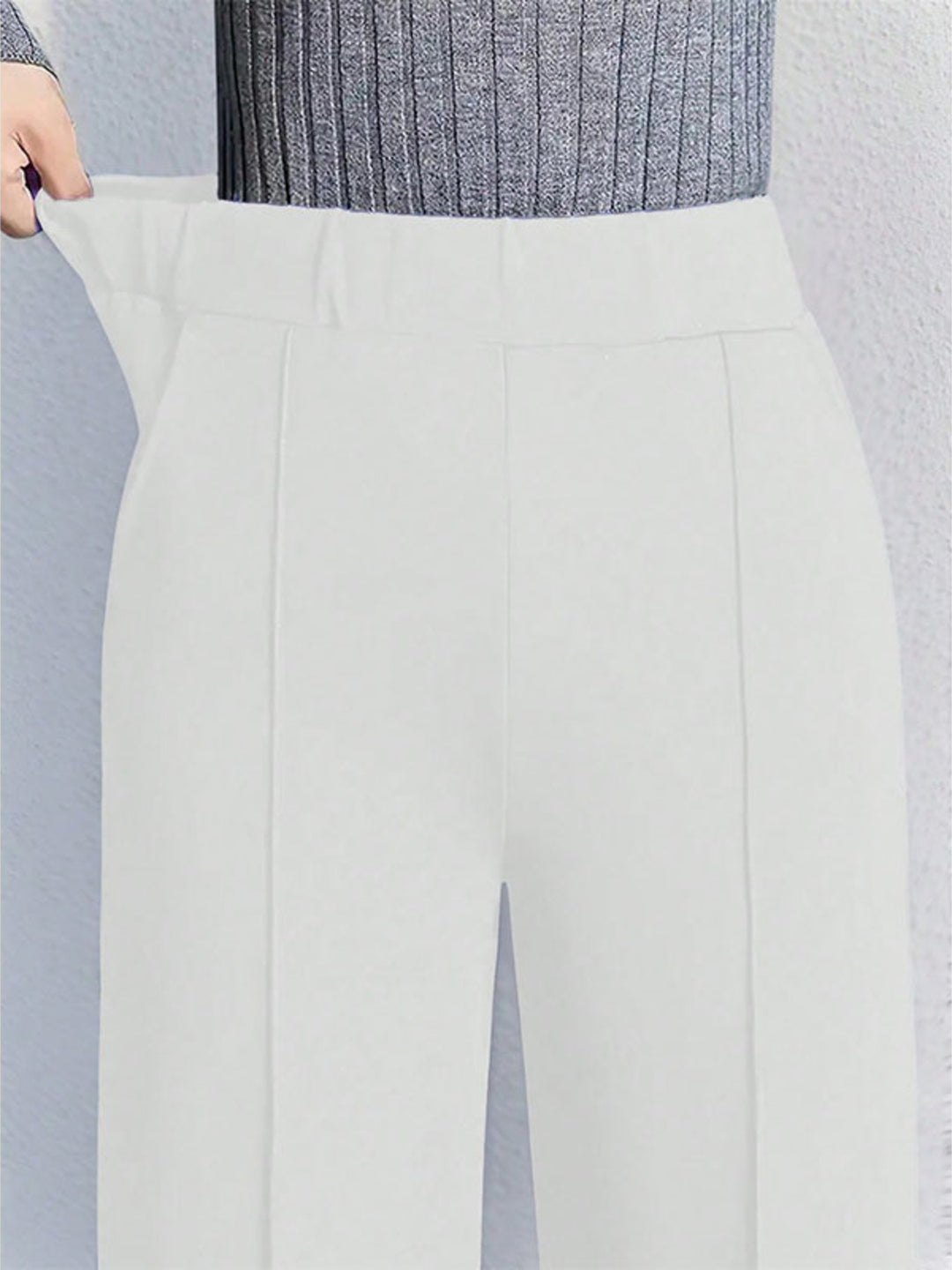 High-waisted wide-leg pintuck pants with pockets