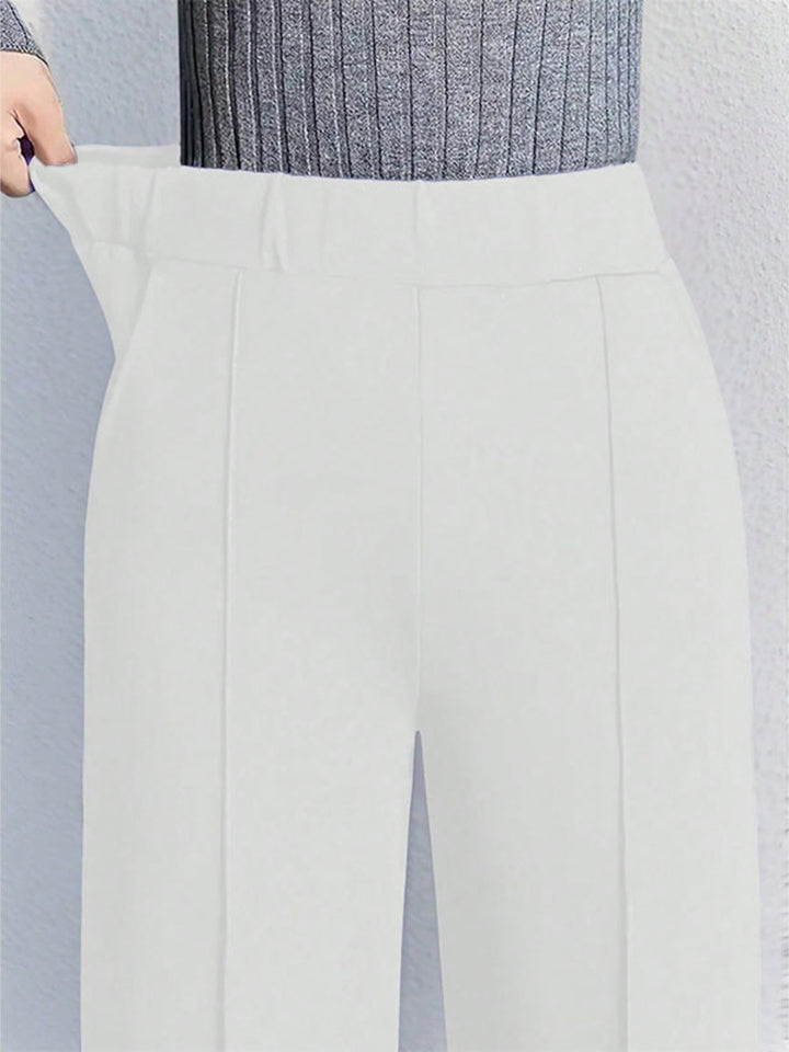 High-waisted wide-leg pintuck pants with pockets