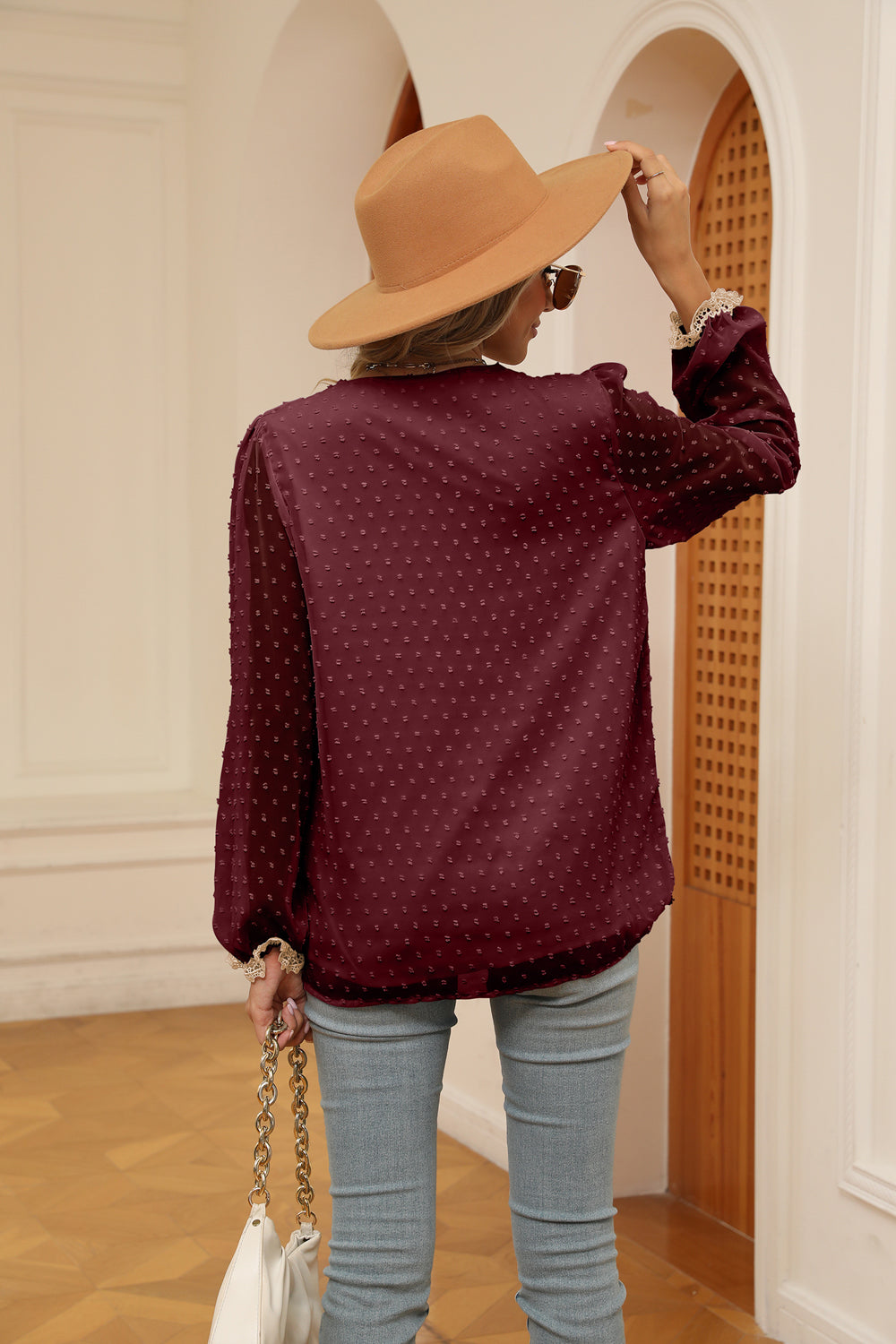 Swiss dot V-neck blouse with crochet lace trim and cuffs