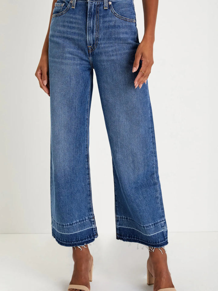 High-rise wide-leg jeans with released hem