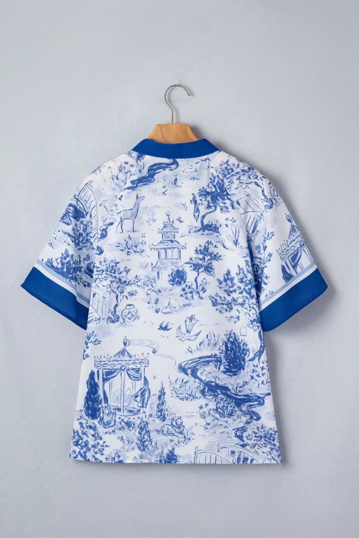 Scenic toile print V-neck raglan sleeve blouse