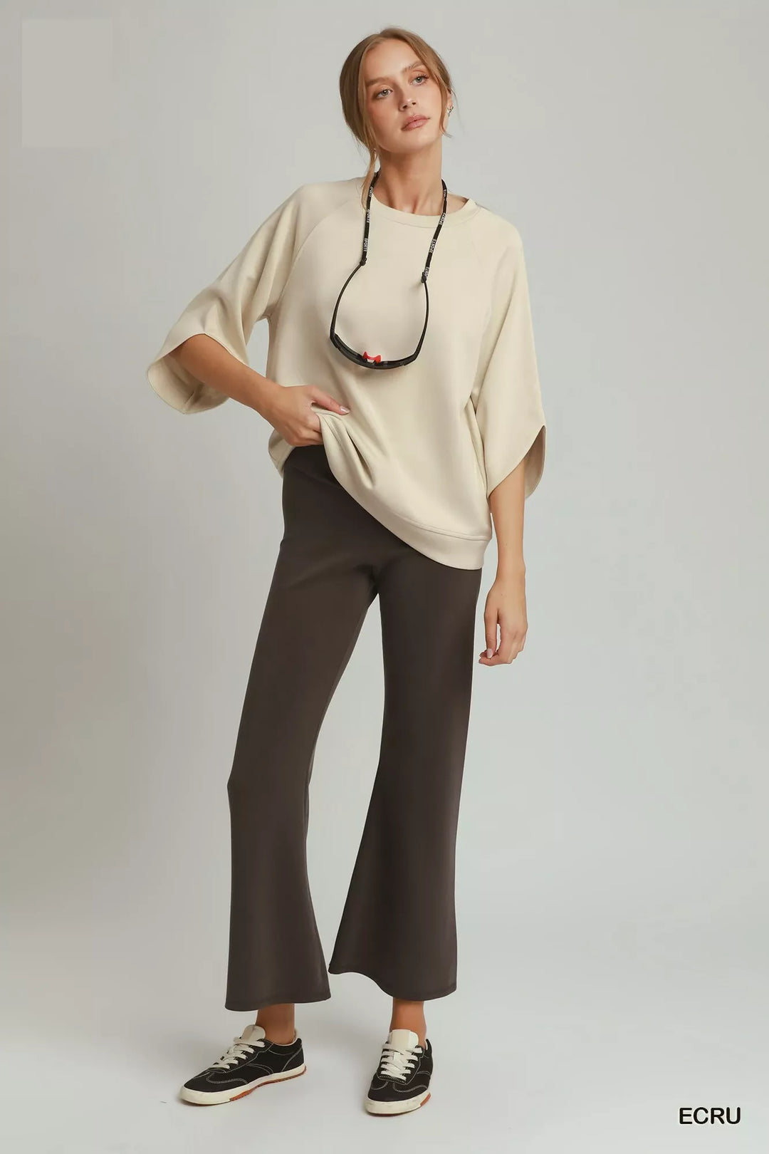 Relaxed raglan pullover with wide sleeves and ribbed hem