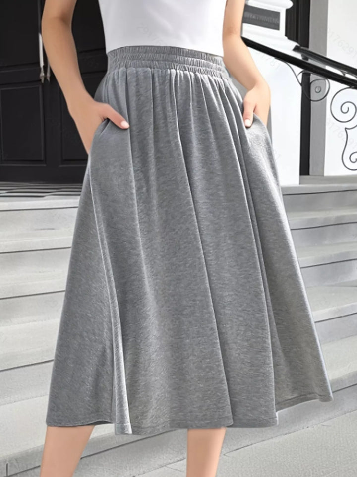 Elastic waist A-line midi skirt with pockets