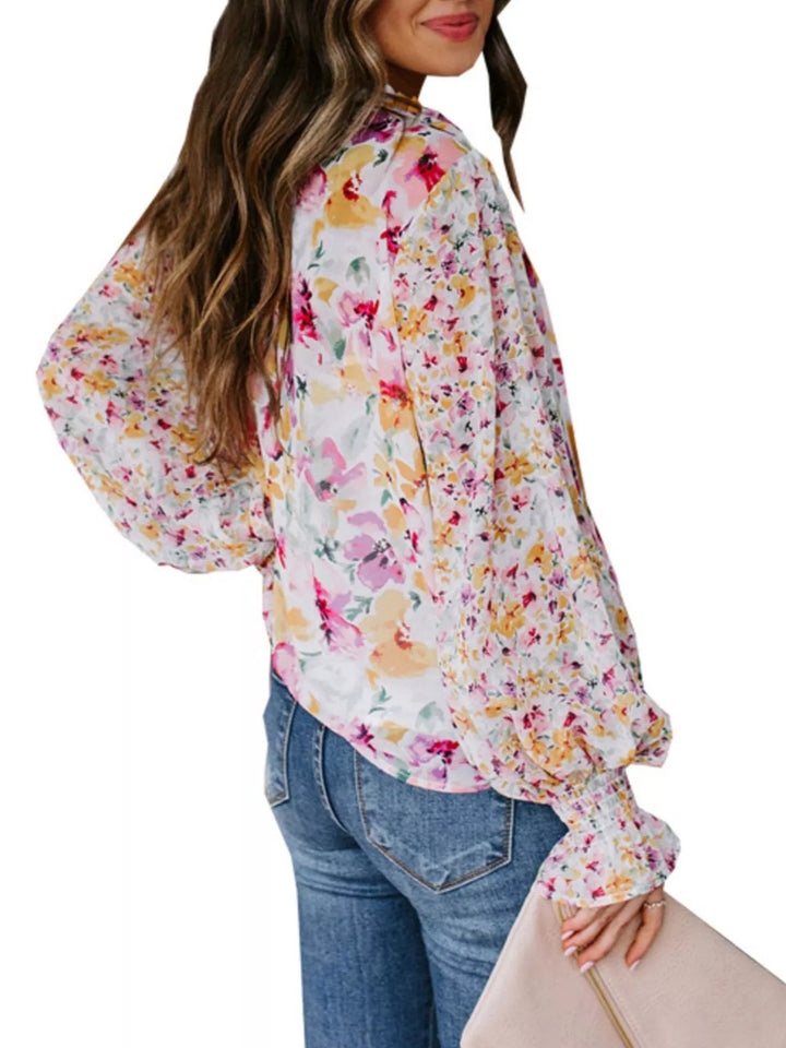 Floral print V-neck button-down blouse with smocked cuffs