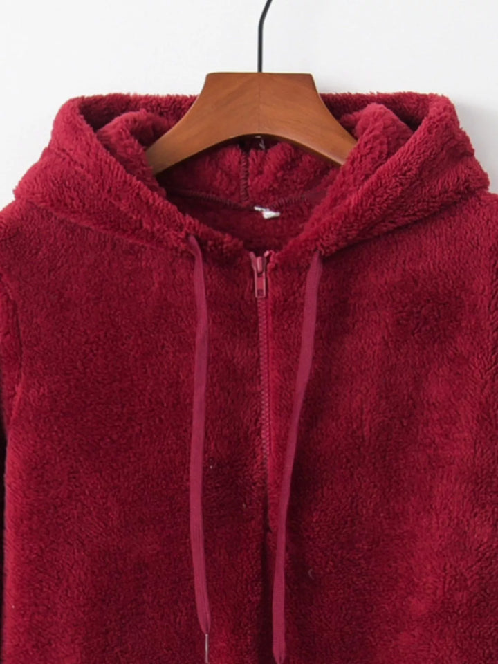 Plush half-zip fleece hoodie with drawstring hood and pockets