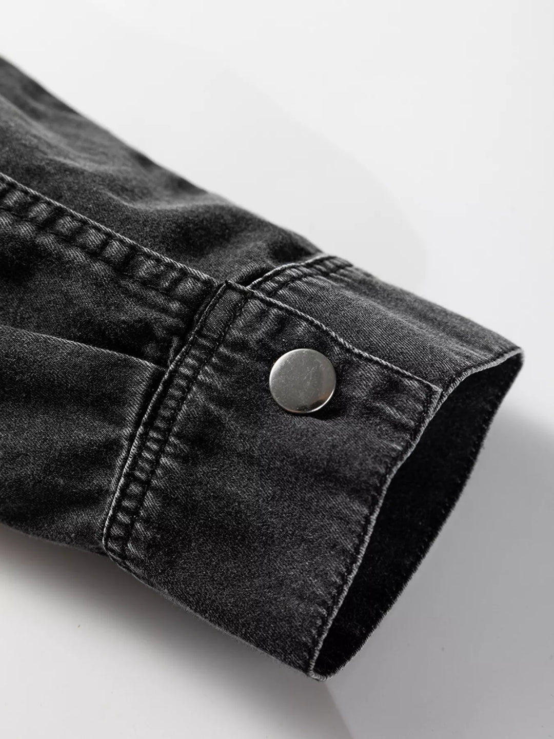 Loose-fit denim shirt dress with raw hem and chest pockets