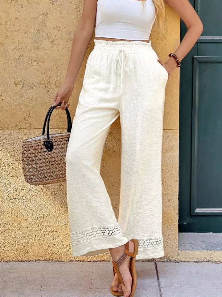 Wide leg drawstring pants with lace trim and pockets