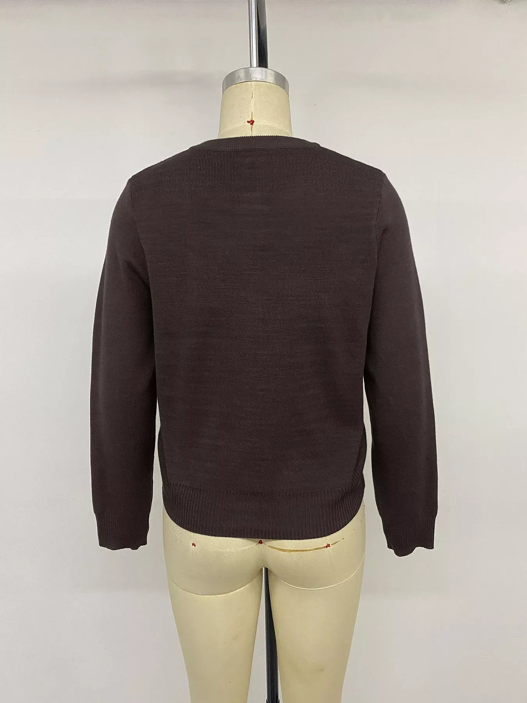 Gold-button knit cardigan with flap chest pockets