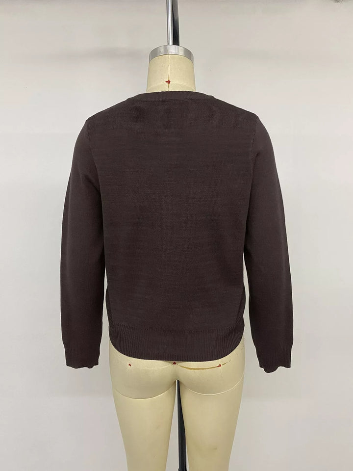 Gold-button knit cardigan with flap chest pockets