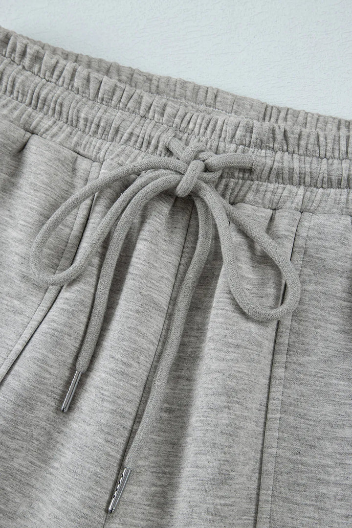 Drawstring wide-leg cargo pants with side pockets