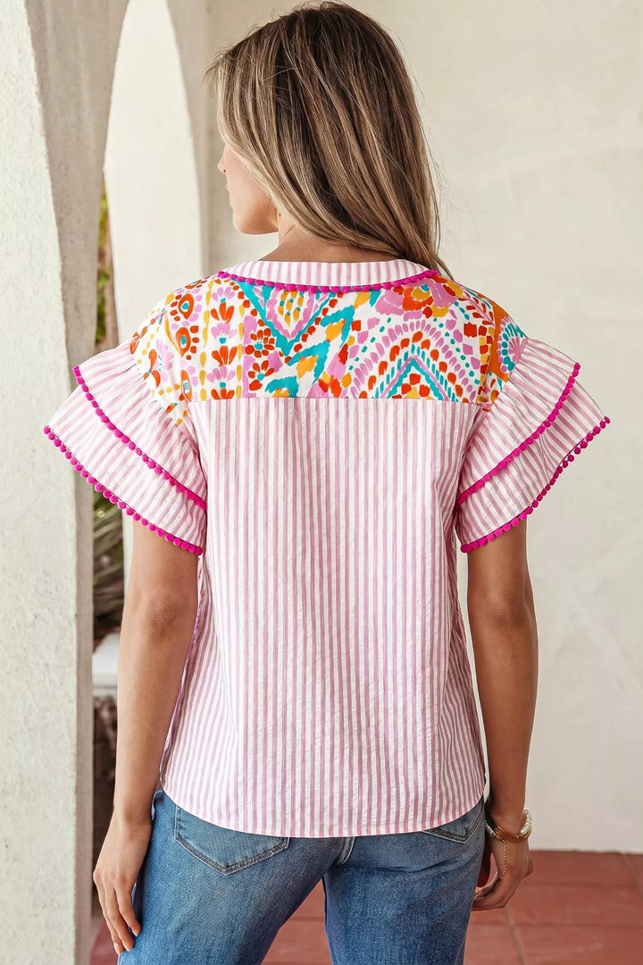 Patchwork mixed print blouse with ruffle sleeves and pom-pom trim