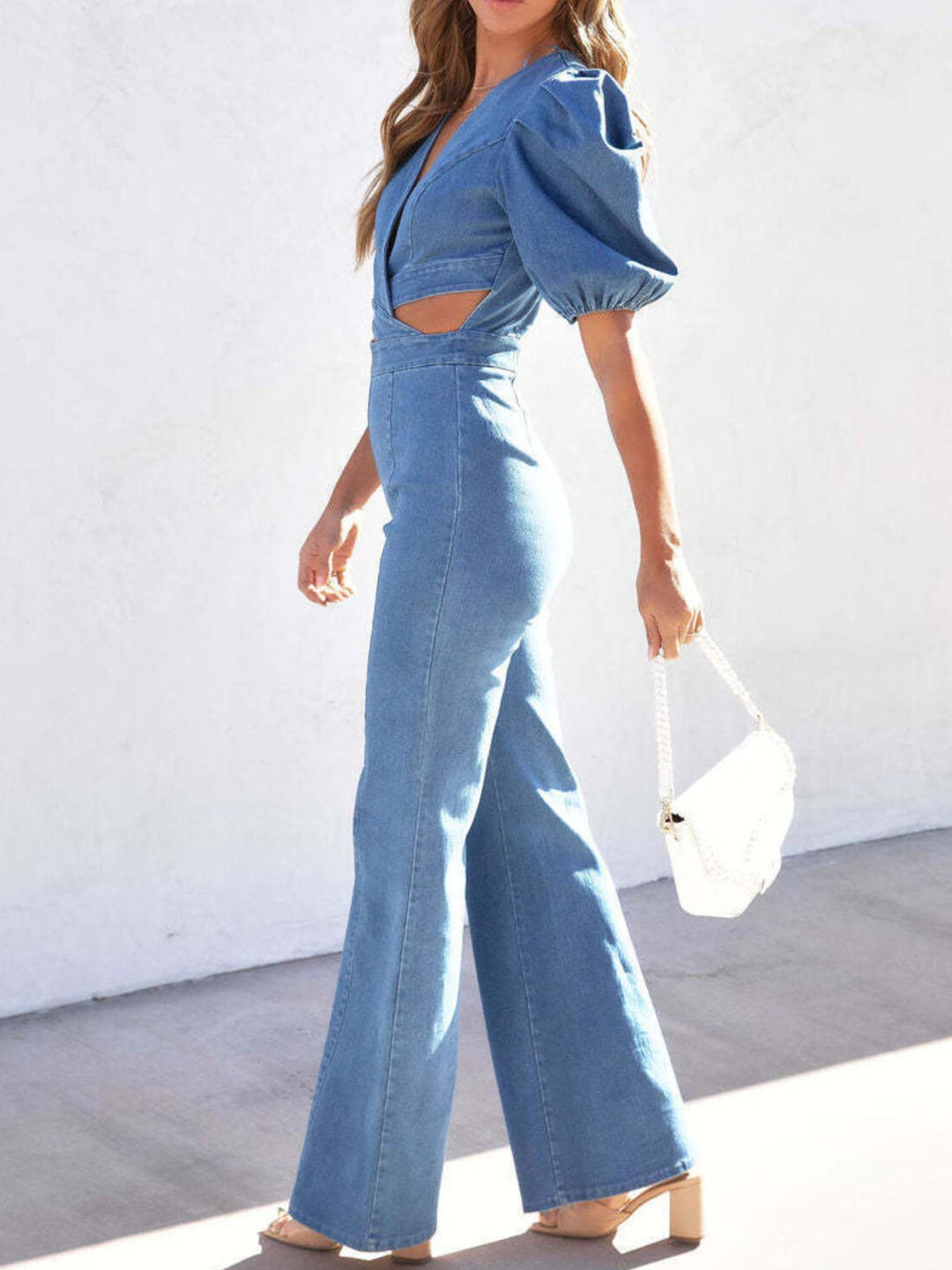 Cutout puff sleeve denim flare jumpsuit with wrap V-neck