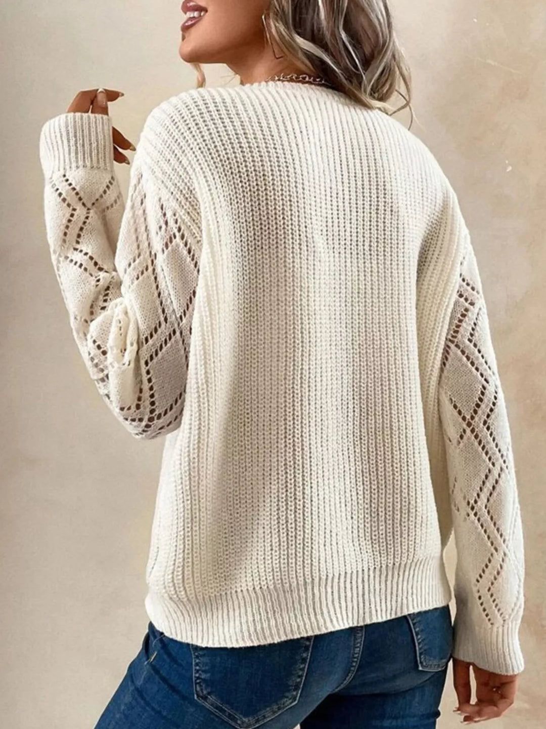 Openwork knit sweater with lace V-neck and diamond sleeves