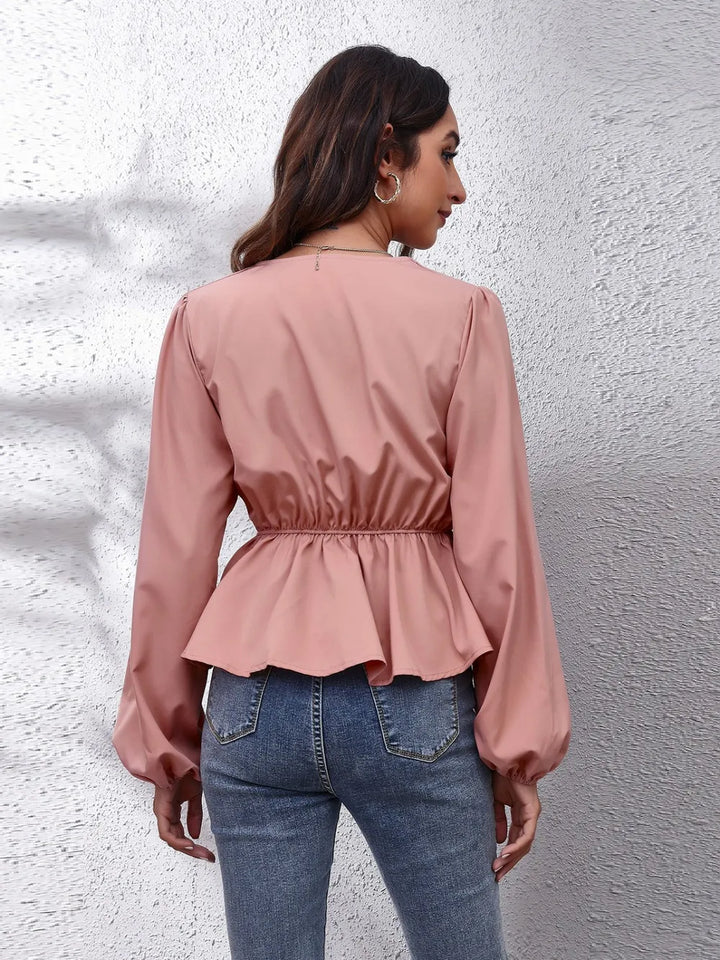 Balloon sleeve peplum blouse with V-neck