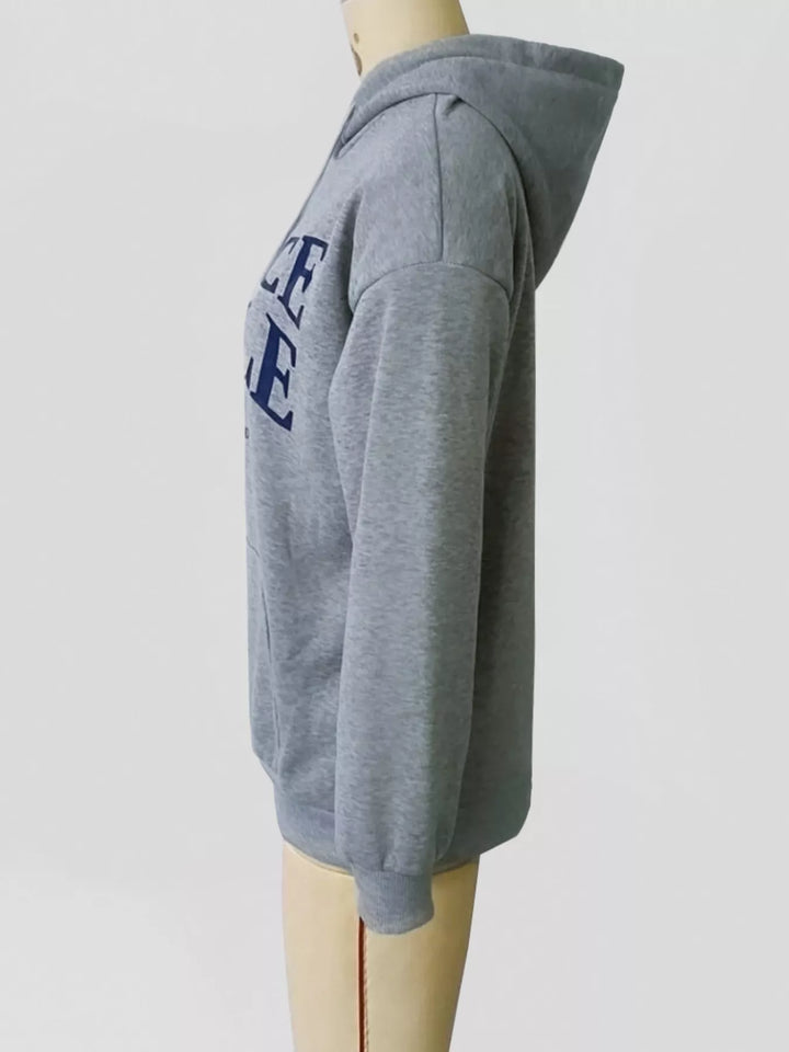 Oversized graphic pullover hoodie with kangaroo pocket