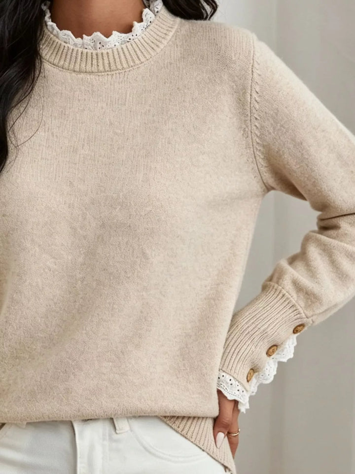 Lace trim crew neck sweater with buttoned ribbed cuffs
