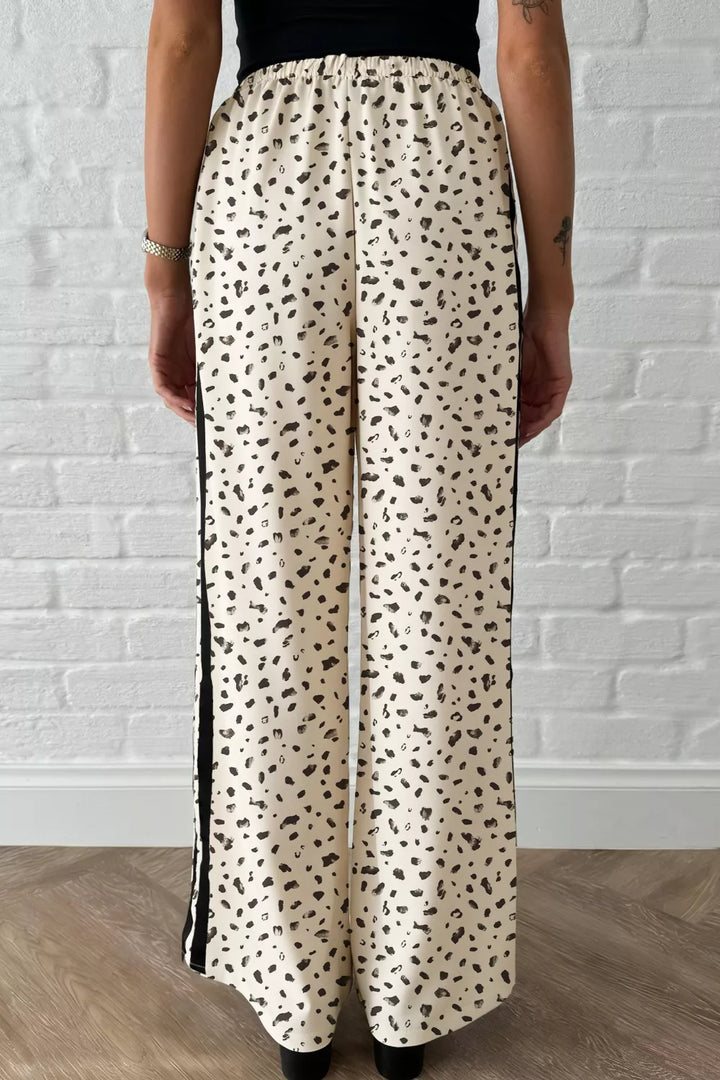Leopard print wide-leg pants with side stripe and drawstring waist