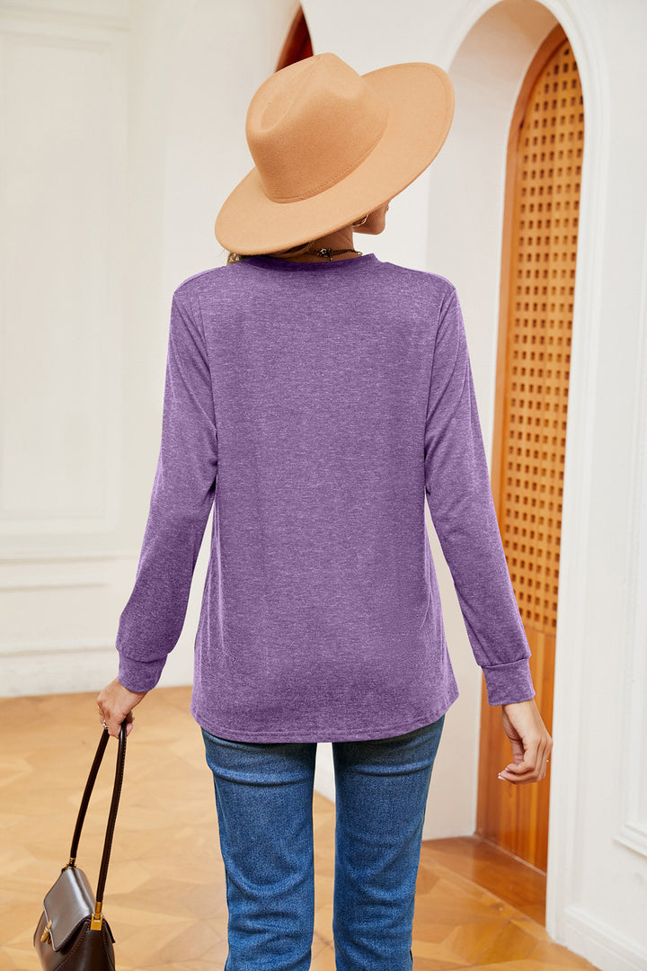 Notch neck long sleeve top with button placket