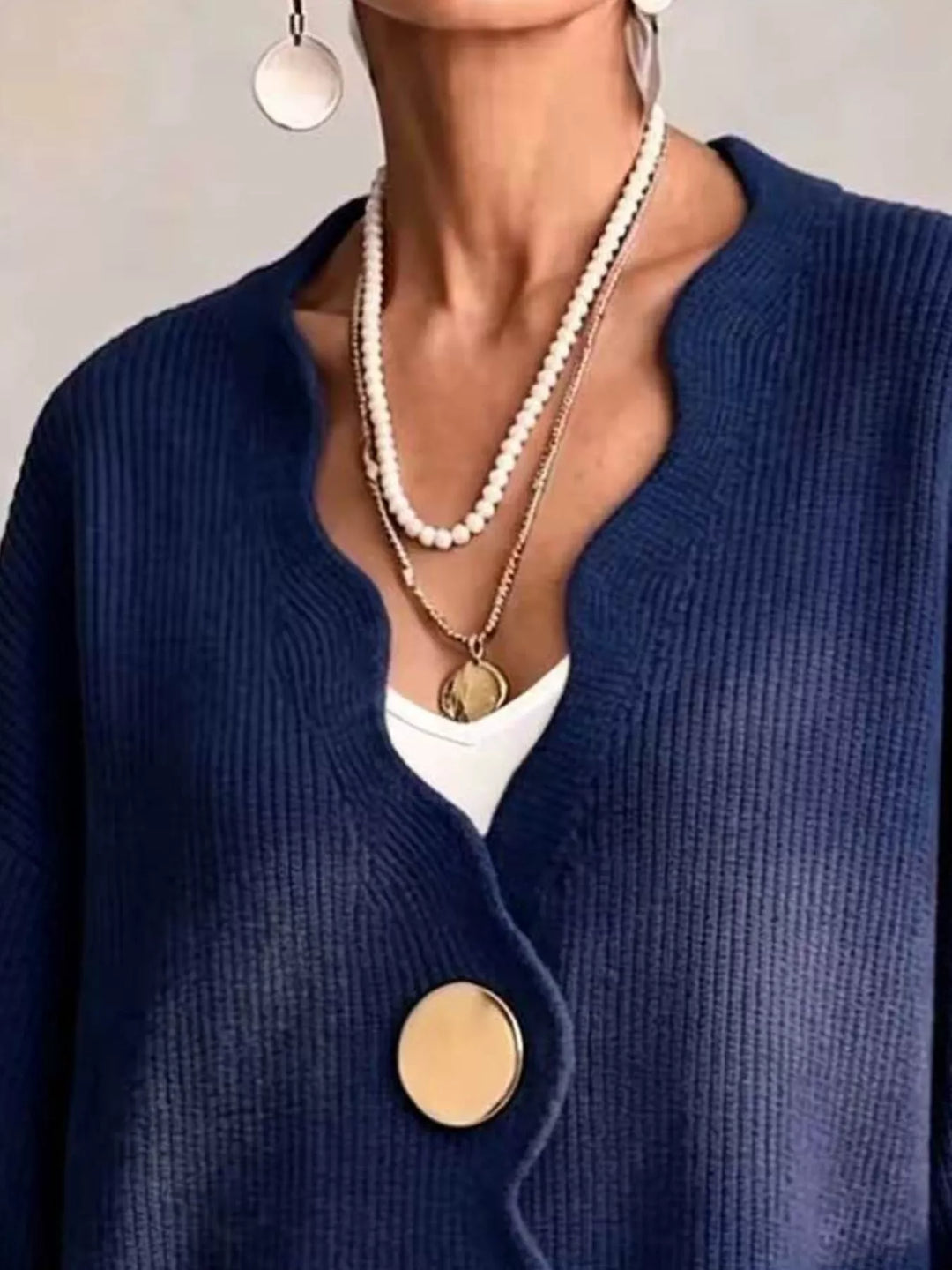 Scalloped-edge ribbed knit oversized button-down cardigan