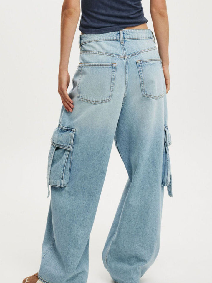 Vintage wash wide-leg cargo jeans with strap pockets