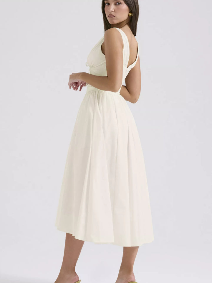 Sleeveless V-neck midi dress with fitted bodice and pockets