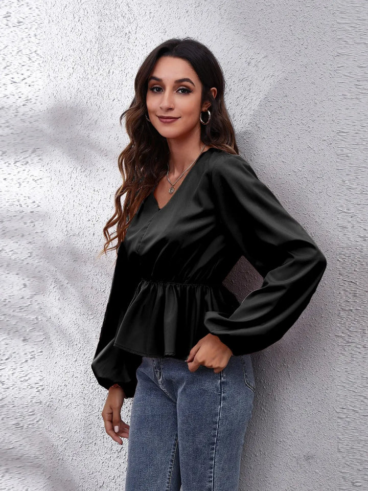 Balloon sleeve peplum blouse with V-neck