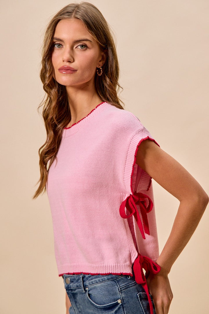 Dolman sleeve knit sweater top with side ribbon ties