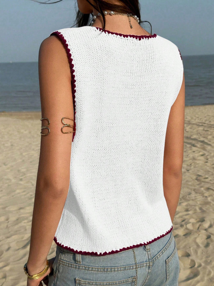 Button-front knit sweater vest with contrast whipstitch trim