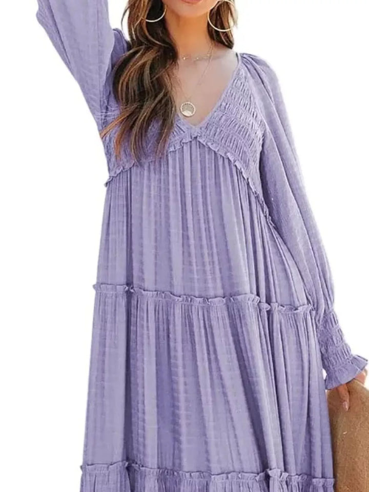 Smocked v-neck tiered maxi dress with long sleeves