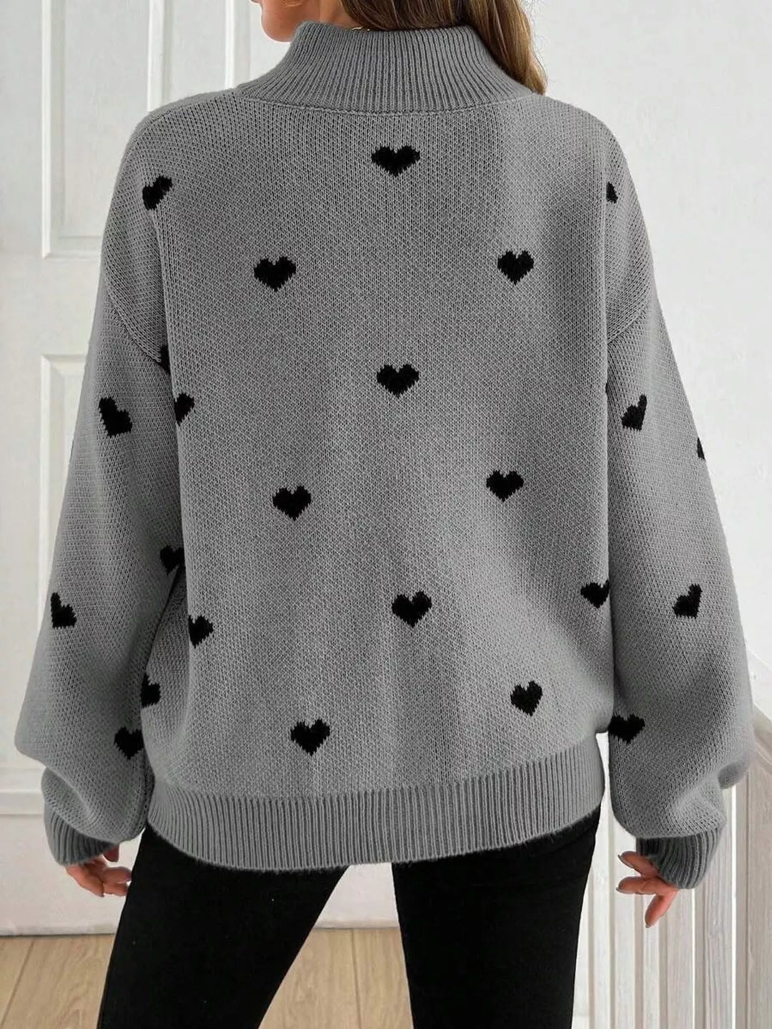 Heart print half-zip mock neck sweater with drop shoulders
