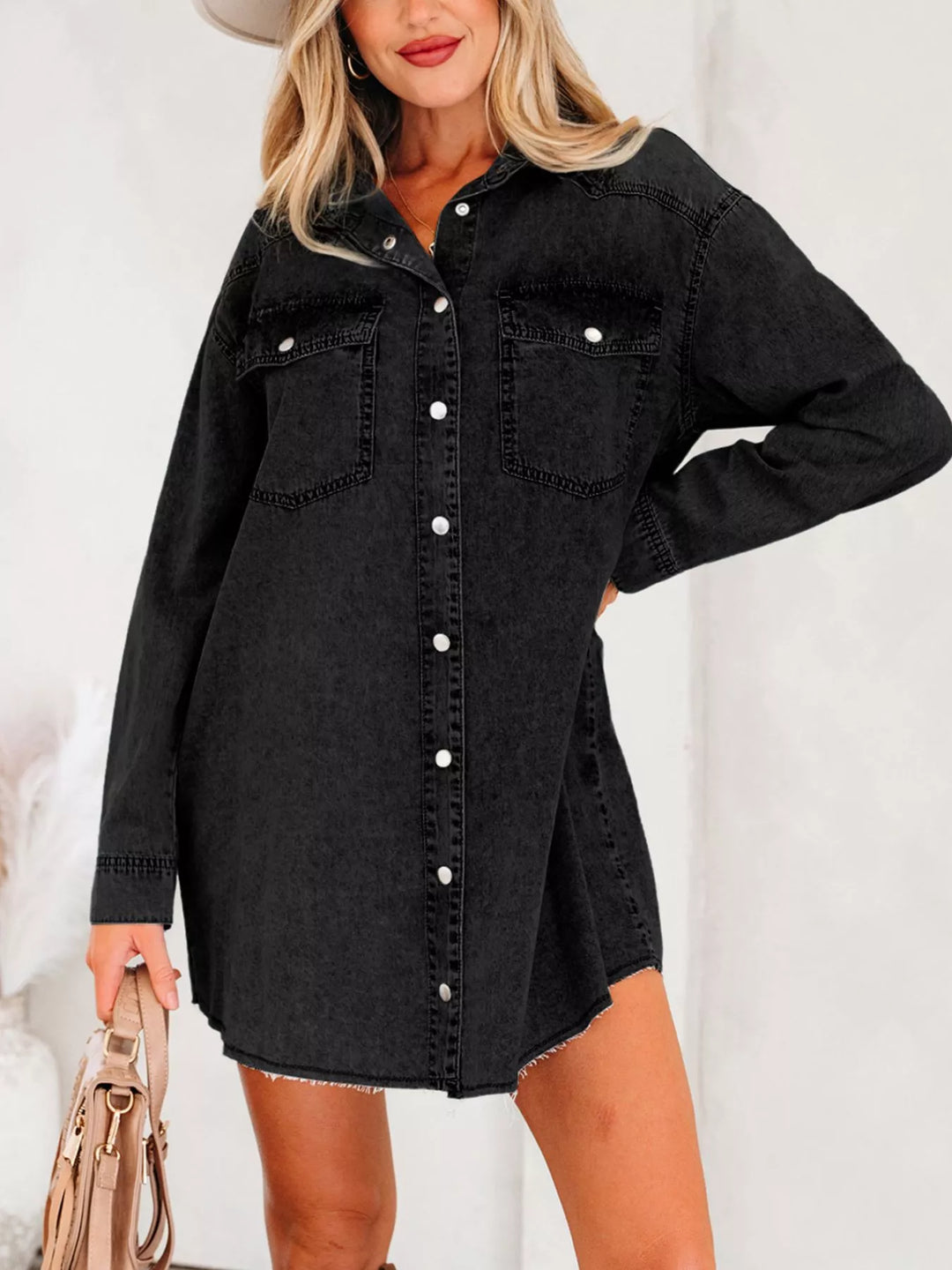 Loose-fit denim shirt dress with raw hem and chest pockets