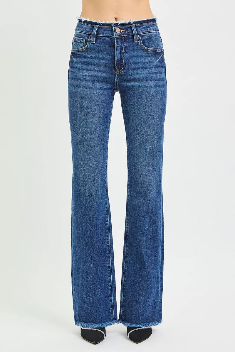 Mid-rise bootcut jeans with frayed waistband and raw hem