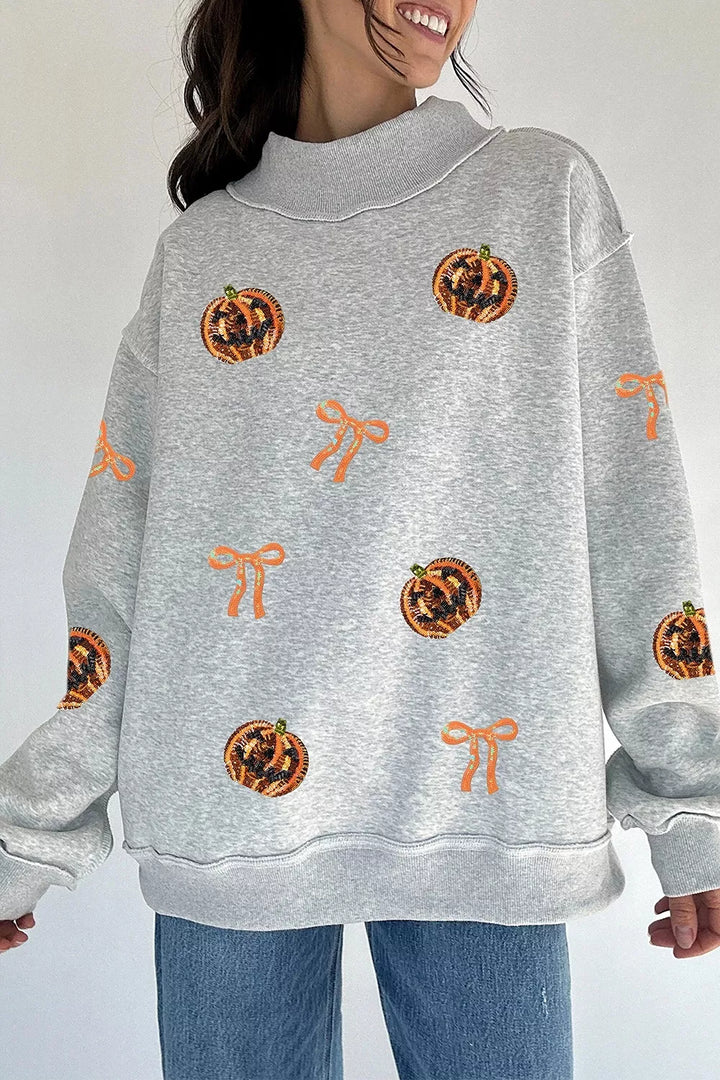 Light Gray Sequin pumpkin and bow exposed seam Halloween sweatshirt