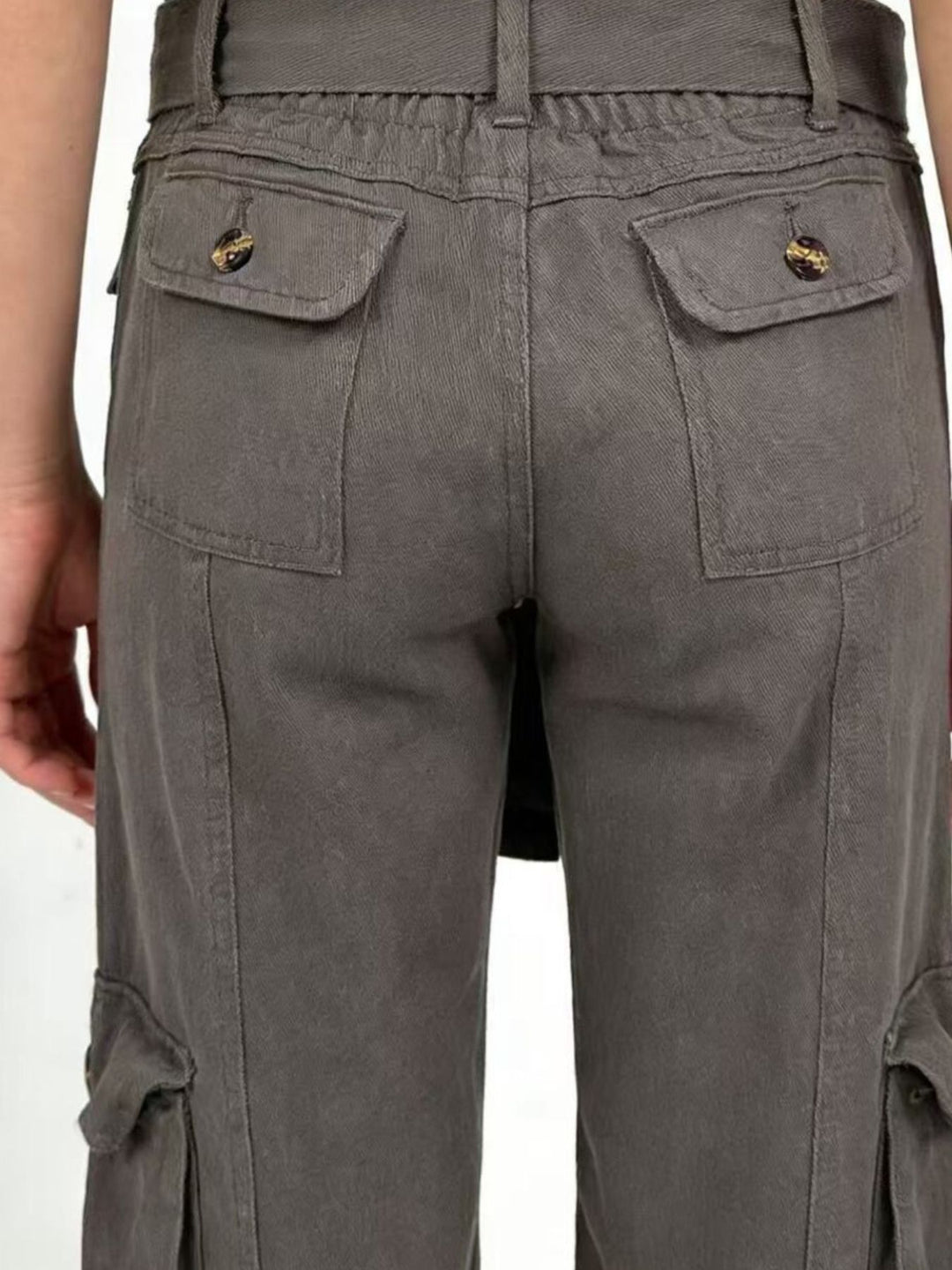 Wide-leg cargo jeans with tie belt and button-flap pockets