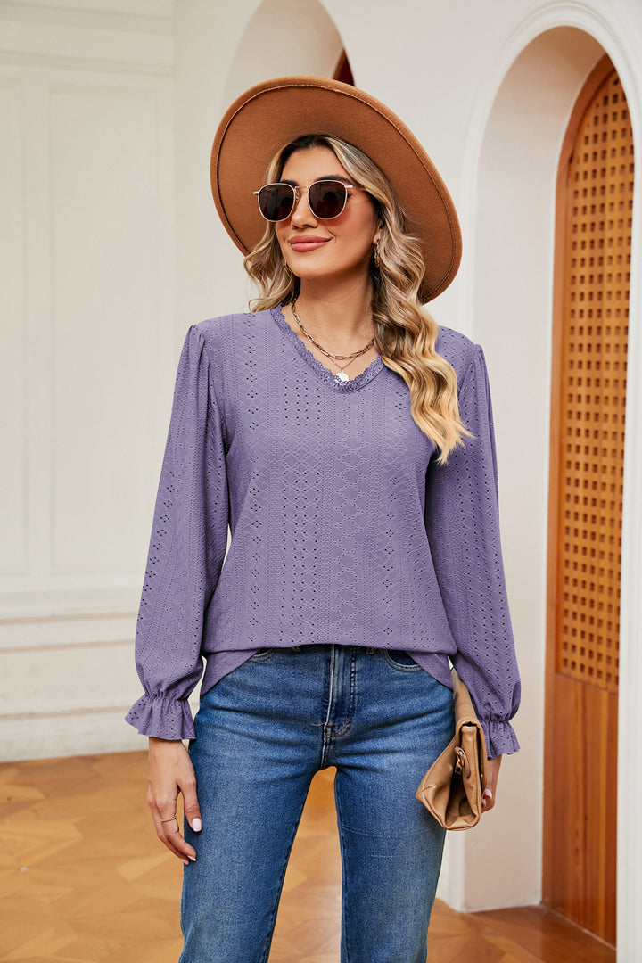 Eyelet V-neck blouse with flounce sleeves and lace trim