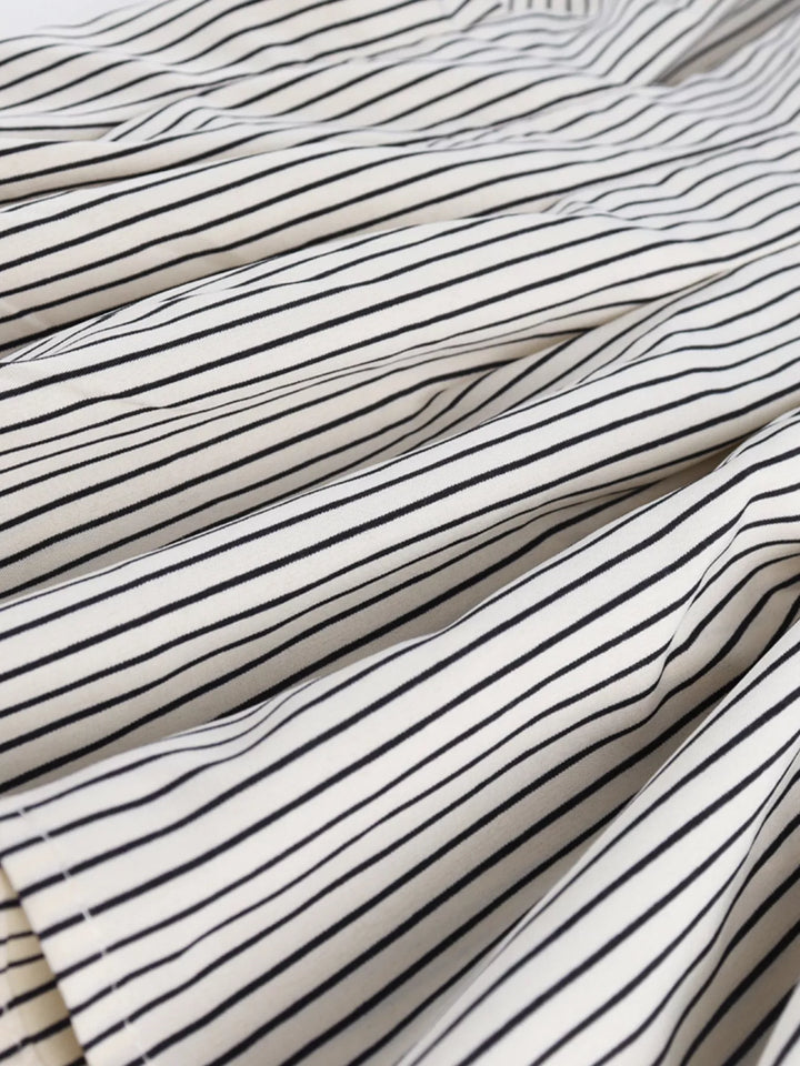 Striped button-down shirt with ruched cinched waist
