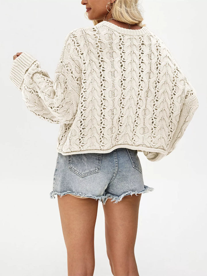 Openwork cable knit henley sweater with drop shoulders