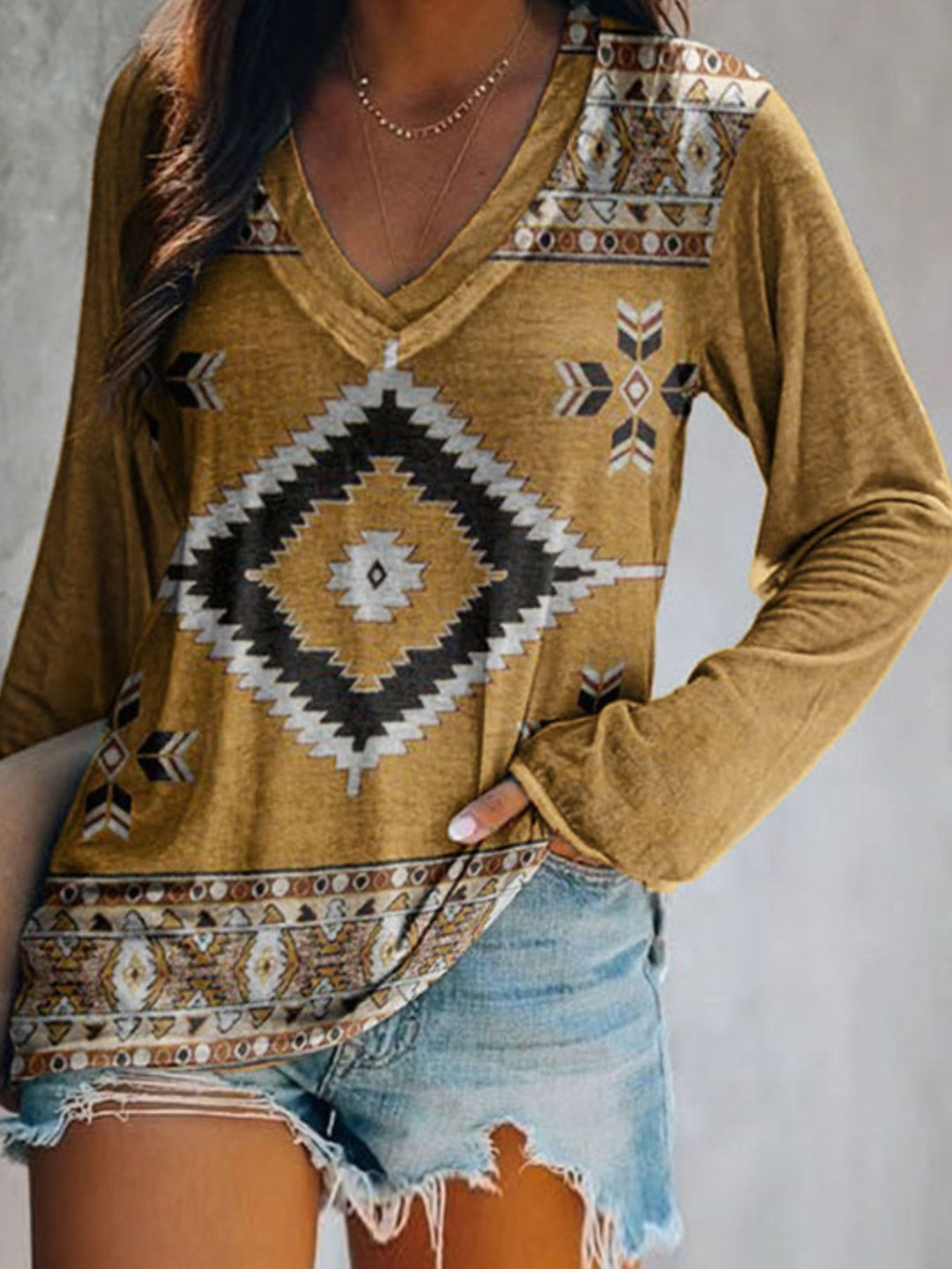 Yellow Aztec geometric print v-neck long sleeve top