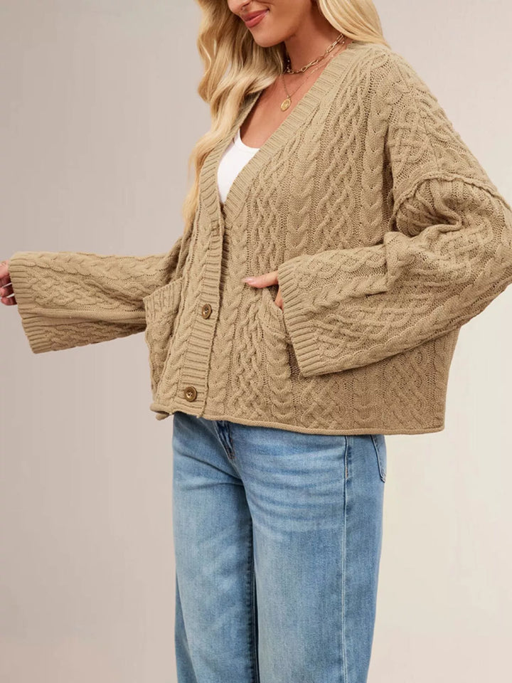 Cable knit button-front cardigan with patch pockets