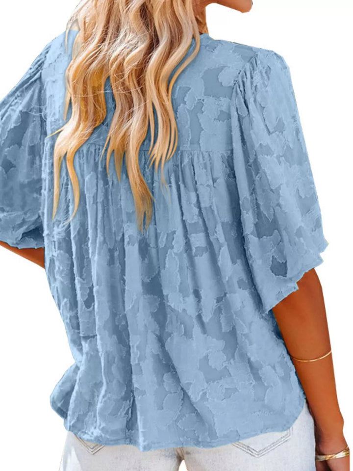 Textured V-neck ruffle-trim button-down blouse