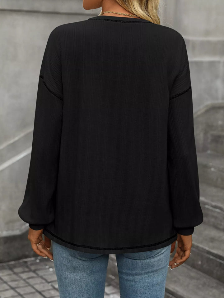 Contrast stitch long sleeve top with patch pocket