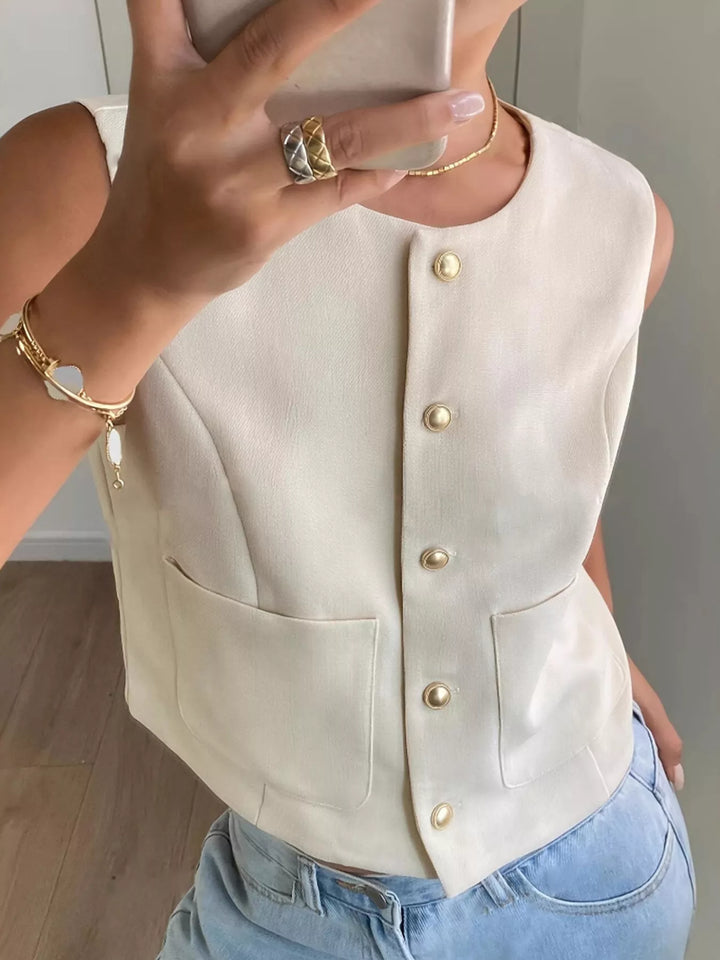 Beige Button-down sleeveless vest with gold dome buttons and patch pockets