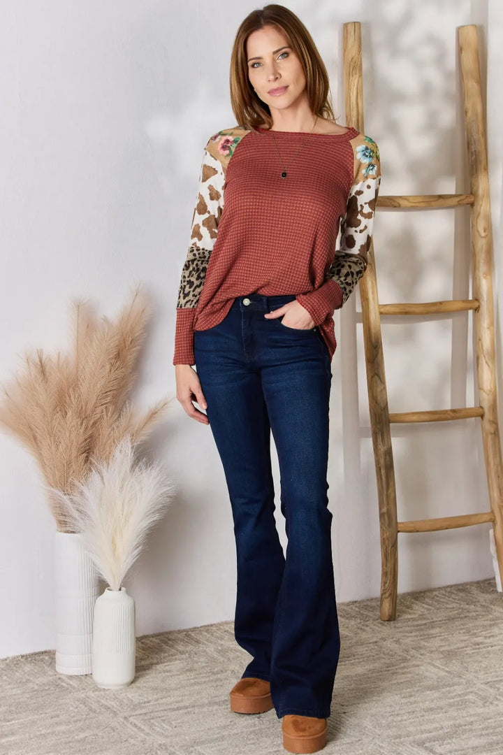 Waffle-knit top with leopard and floral print sleeves