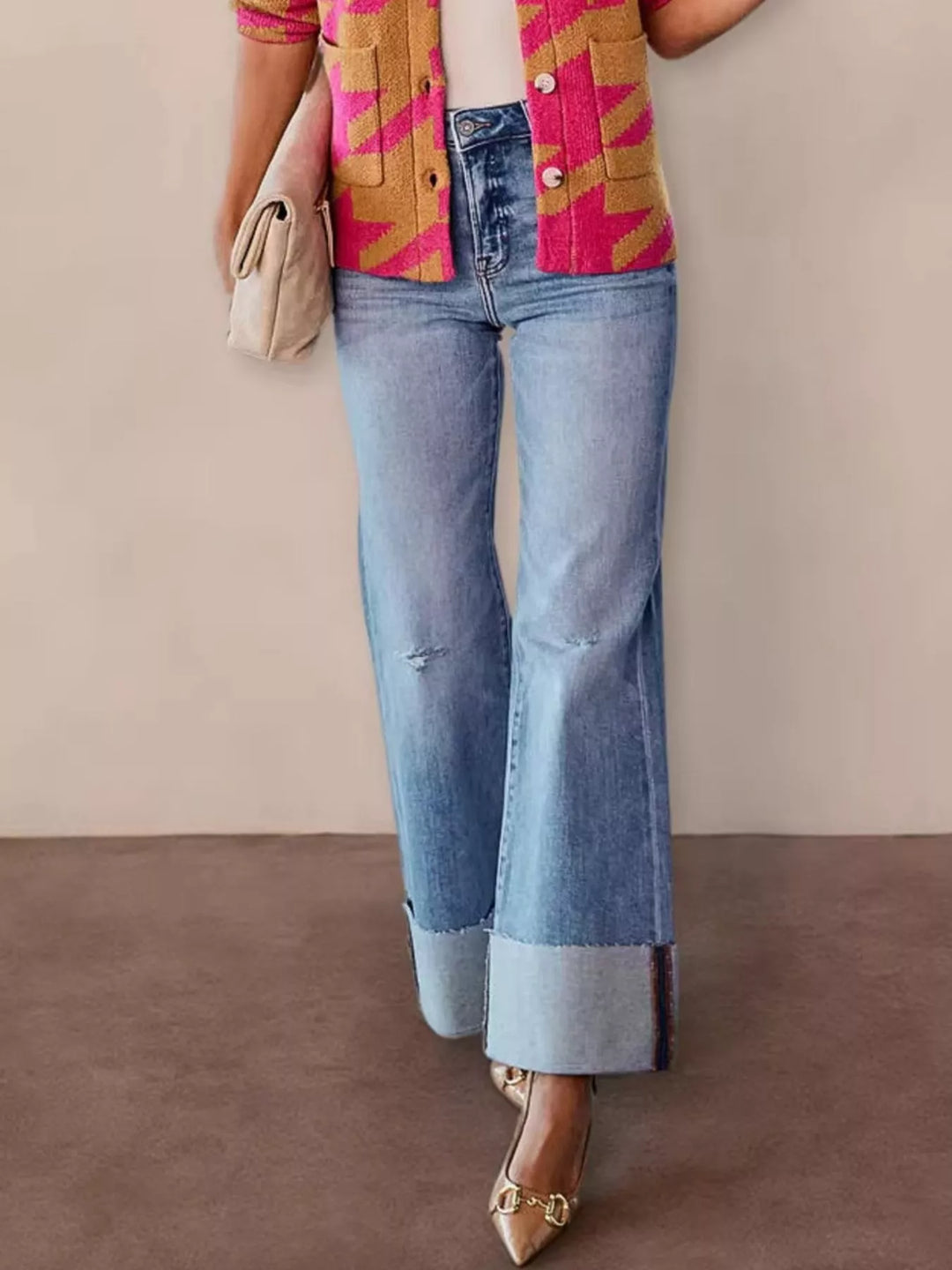 Distressed high-rise flare jeans with raw cuffed hem