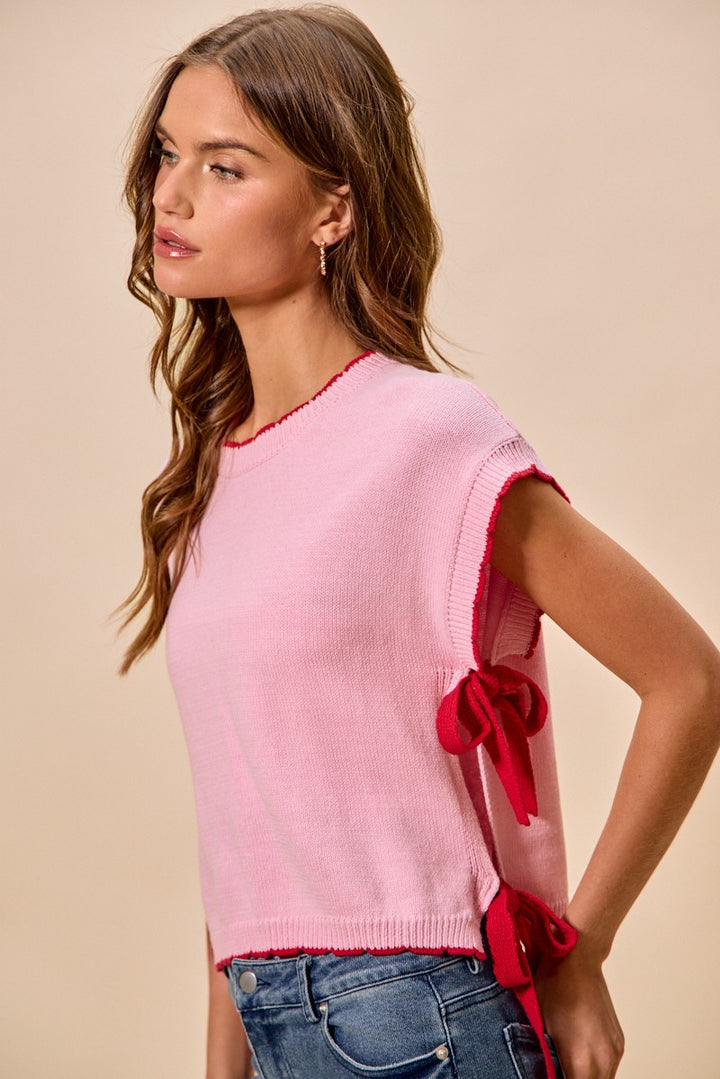 Dolman sleeve knit sweater top with side ribbon ties